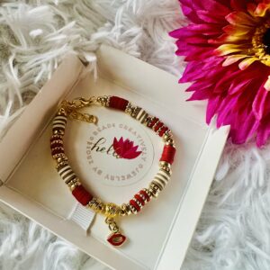 red clay beaded bracelet with kiss